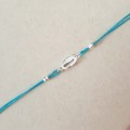 854-BR-2-jeweline-bransoletka-sznurek-muszla-kauri-srebro-925-niebieski.jpg