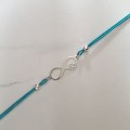 1081-BR-5-jeweline-srebro-925-bransoletka-nieskończoność-z-koniczynką-sznurek-niebieski.jpg