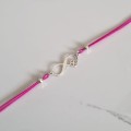 1081-BR-10-jeweline-srebro-925-bransoletka-nieskończoność-z-koniczynką-sznurek-różowy.jpg