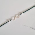 1081-BR-11-jeweline-srebro-925-bransoletka-nieskończoność-z-koniczynką-sznurek-zielony.jpg