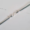 1052-BR-11-jeweline-bransoletka-sznurkowa-srebro-925-niesończoność-sznurek-zielony.jpg