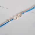 1037-BR-14-jeweline-bransoletka-srebro-925-nieskończoność-góry-sznurek-niebiski.jpg