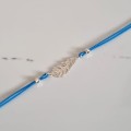 1001-BR-10-jeweline-bransoletka-sznurkowa-pióro-sznurek-niebieski.jpg