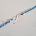 1006-BR-9-jeweline-bransoletka-sznurkowa-nieskończoność-z-kotem-sznurek-niebiseki.jpg