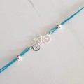 1044-BR-4-jeweline-bransoletka-srebro-925-rower-sznurek-niebieski.jpg